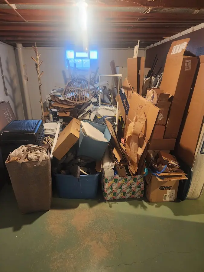 Roll-off dumpster container at job site for Cleanout Dumpster Rental in Goshen